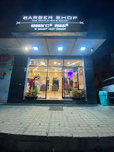 The Gentlemen's Salon exterior at night